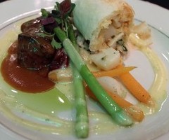 Duet of Pan Seared Beef Tenderloin & Seafood Strudel of Lobster, Shrimp, & Scallop